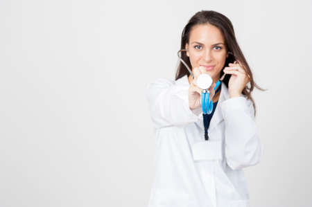 Doctor. Blue stethoscope in handの写真素材