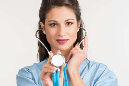 Medical doctor showing stethoscopeの写真素材