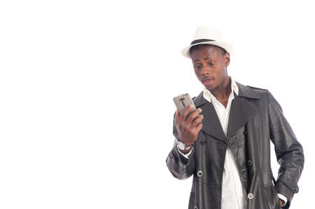 Black African American man using a cell phoneの写真素材