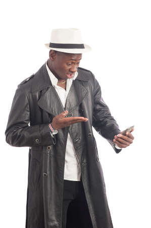 Black African American man using a cell phoneの写真素材