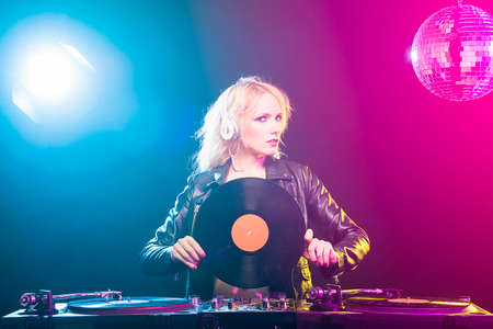 Blonde woman djの写真素材