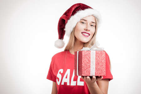 Beautiful young woman with Christmas presentの写真素材