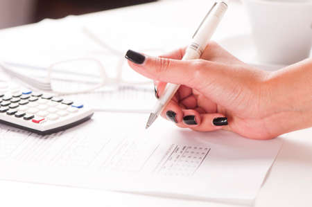 Close up of female accountantの写真素材