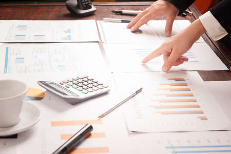 Business people discussing the charts and graphs. Successful teamwork conceptの写真素材