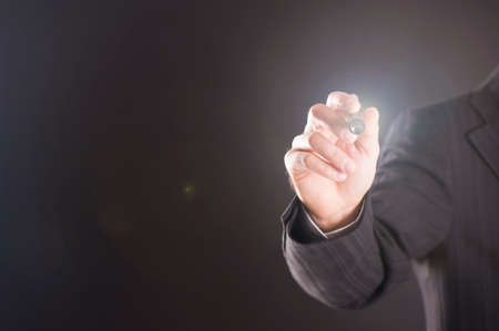 Business man using a markerの写真素材