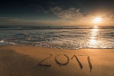 2017 written on sandy beachの写真素材