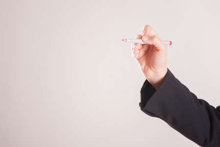 Businesswoman using a markerの写真素材