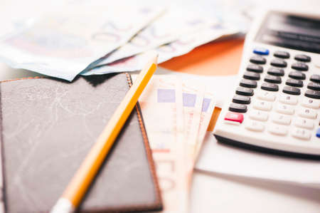 Agenda with euro banknotesの写真素材