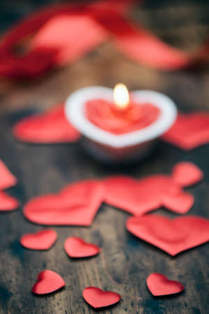 Valentine's day, dark background candle heartの写真素材