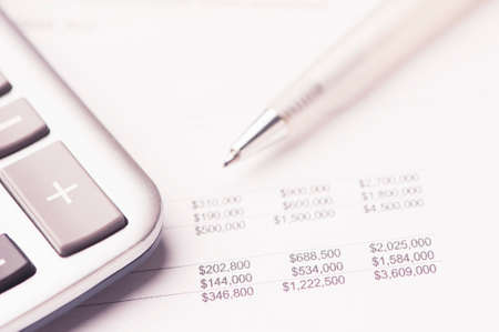 Financial paper charts and graphs on the tableの写真素材