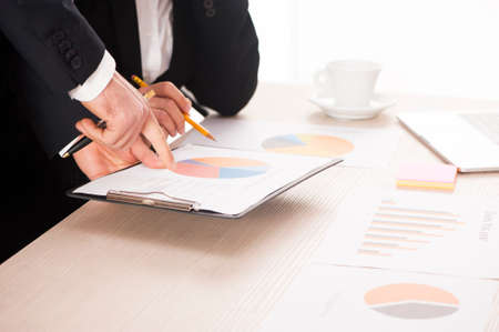 Business people during paperwork at meeting