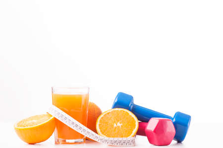 Fitness concept with dumbbells and healthy food