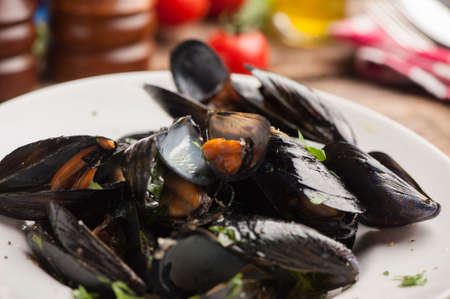 Fresh mussels on a plateの写真素材