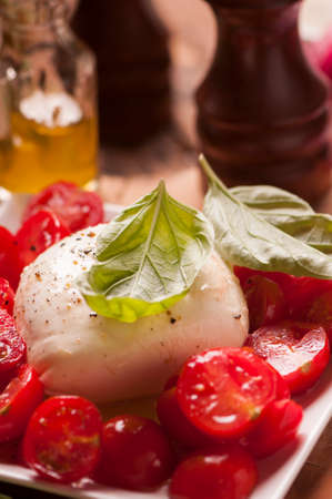 Caprese salad with baby mozzarella cheese