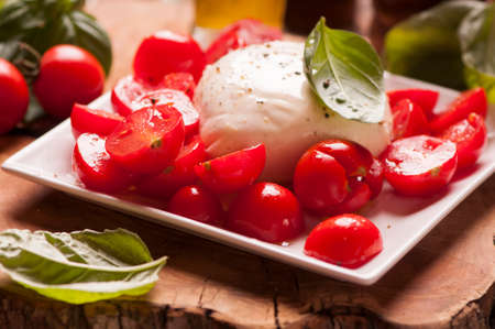 Caprese salad with baby mozzarella cheeseの写真素材
