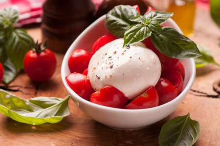 Caprese salad with baby mozzarella cheeseの写真素材