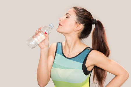 Sports Woman with a bottle of waterの写真素材
