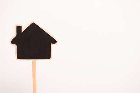 New home concept. Chalk board shaped houseの写真素材