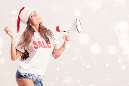 Santa Woman Yelling with Megaphoneの写真素材