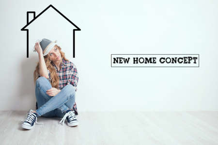 Dreaming concept. Young lady moving in new house
