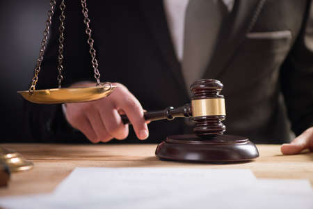 judge with a gavel and the justice scaleの写真素材