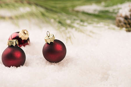 Baubles in the snow. Christmas greetingの写真素材