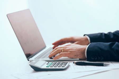 Businessman working in his laptopの写真素材