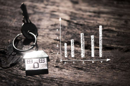 House key on a wooden tableの写真素材