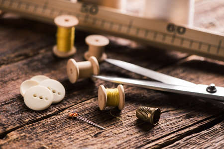 Sewing tools on wooden table