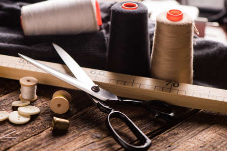 Sewing tools on wooden table