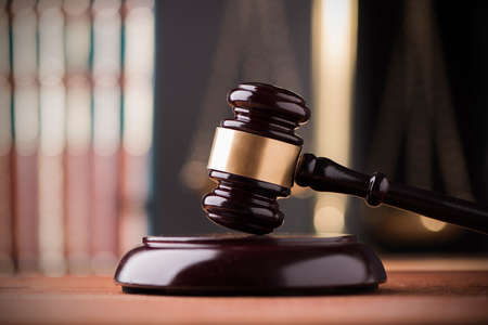 Law scales and wooden gavelの写真素材