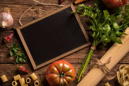 Italian food cooking ingredients. Pasta, vegetables. Top view with copy spaceの写真素材