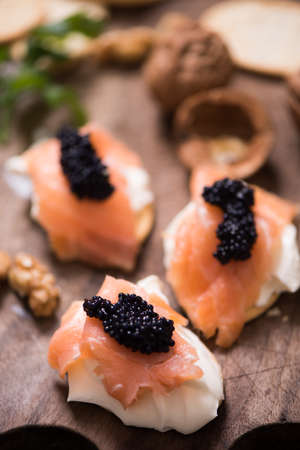Canapes with smoked salmon and caviarの写真素材