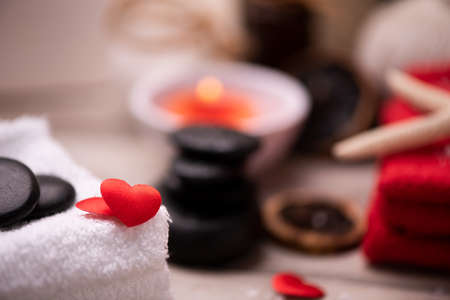 Wellness docoration on valentine's day with candels and stonesの写真素材