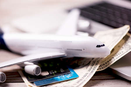 Aircraft banknotes on a notebook. Travelling conceptの写真素材
