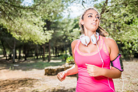 Young woman running in the park