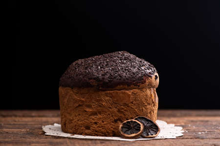 Choccolate panettone on a rustic table