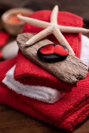 Wellness docoration on valentine's day with candels and stonesの写真素材