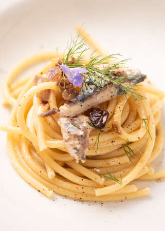 Bucatini, Italian pasta with sardienes, close upの写真素材