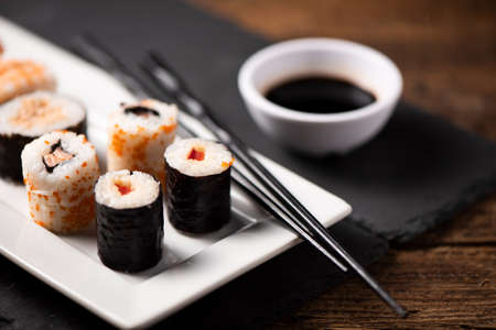 Traditional Japanese sushi on a plate close upの写真素材