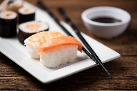 Traditional Japanese sushi on a plate close upの写真素材
