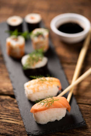 Traditional Japanese sushi on a plate close upの写真素材