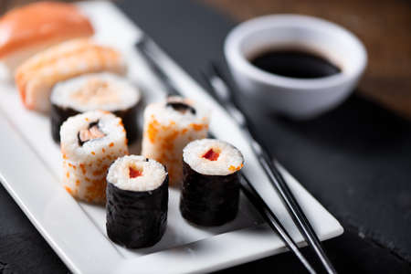 Traditional Japanese sushi on a plate close upの写真素材