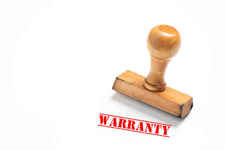 Rubber stamp with warranty sign on white background. Close upの写真素材