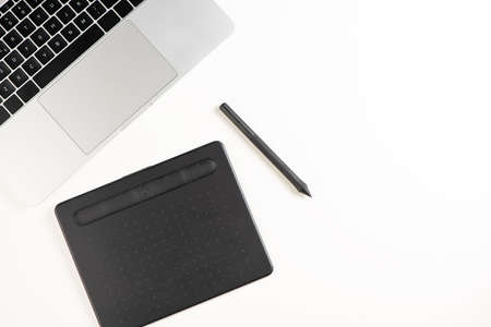 Graphic Designer white work table with computer and coffee. Desk top view.の写真素材