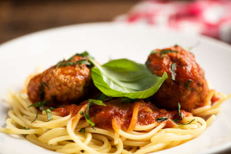 Beef meatballs with bolognese sauce and spaghetti. Close upの写真素材