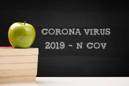 School Closed COVID-19 text written on blackboard  close upの写真素材