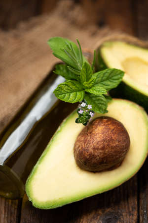 An avocado  on woodenの写真素材