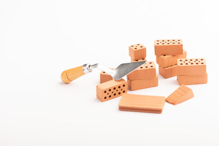 Brown bricks on a white background. Construction Materials close up