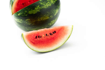 Fresh water melon and three slices isolated on white, Close upの写真素材